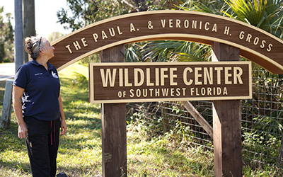 Wildlife Center of South Florida Executive Director Pamela DeFouw stands outside the center's 10-acre property in Sarasota County. 